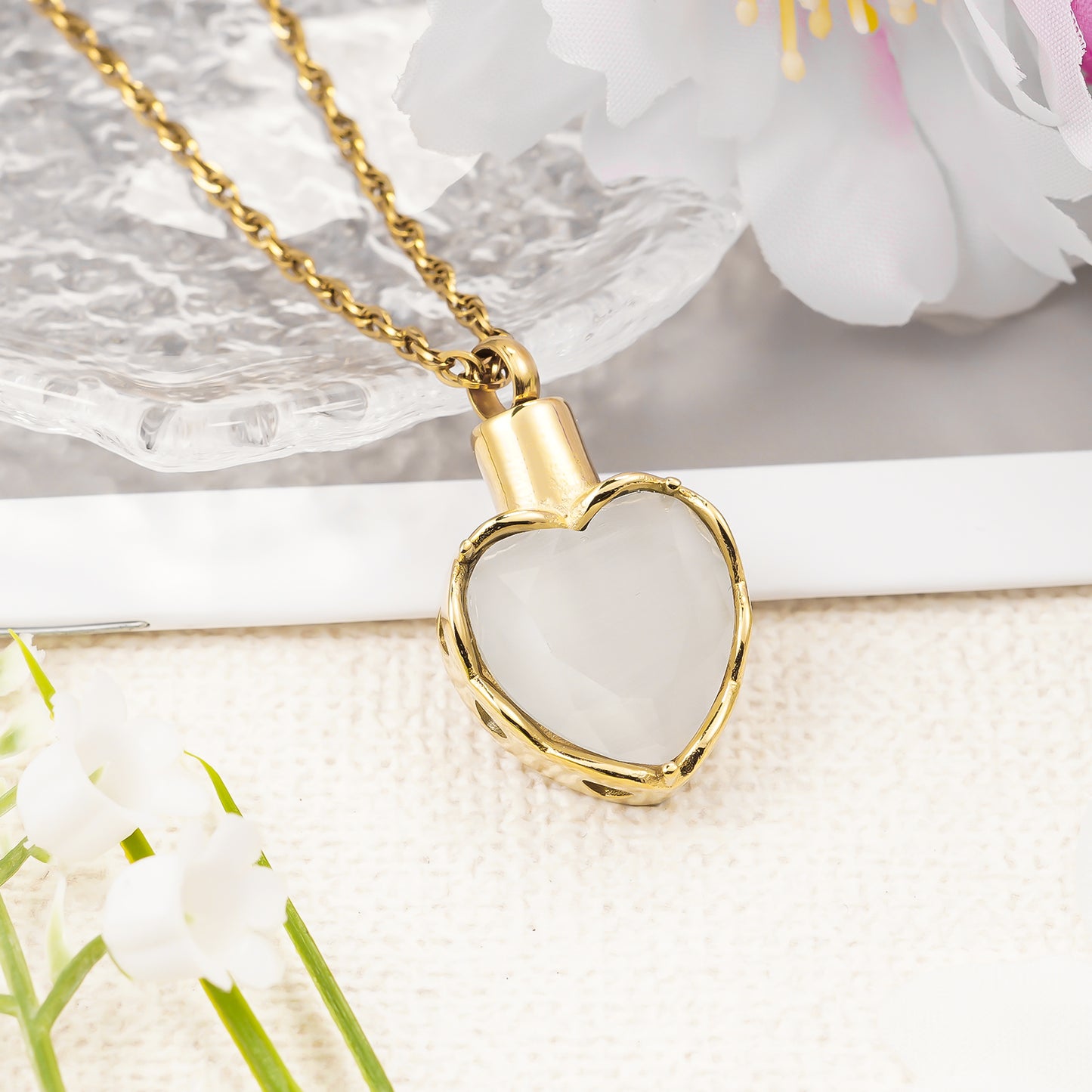 Gold heart pendant with white stone for ashes