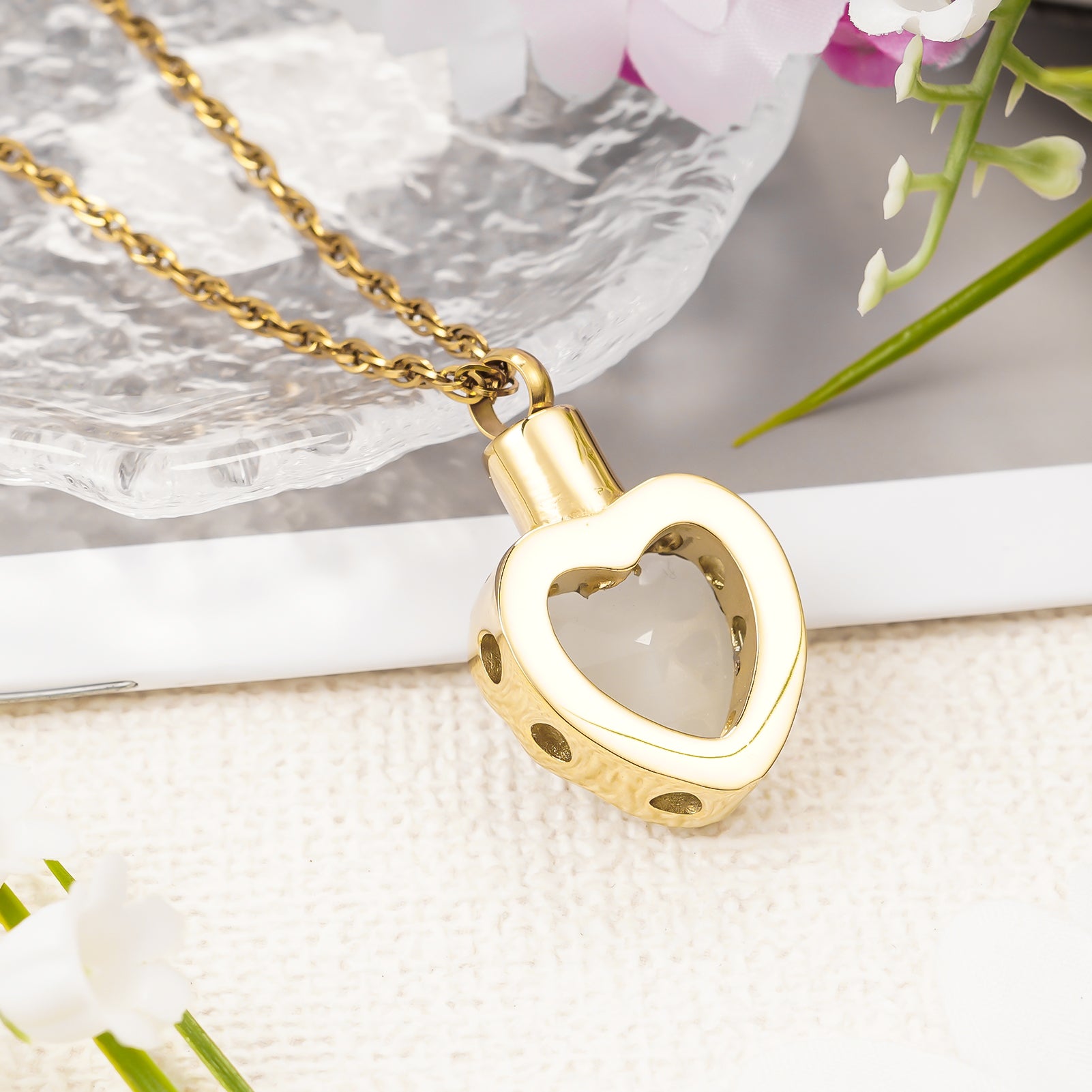 Gold heart pendant with white stone for ashes