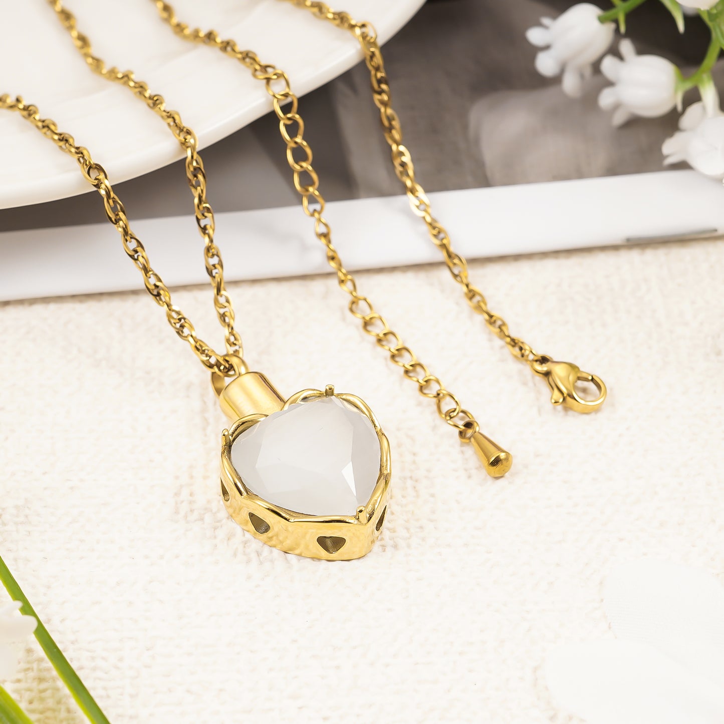 Gold heart pendant with white stone for ashes