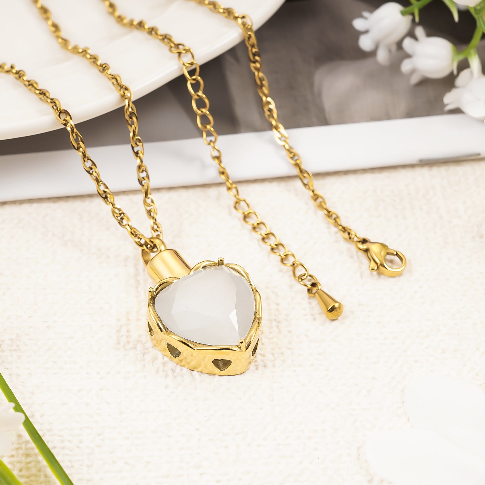 Gold heart pendant with white stone for ashes