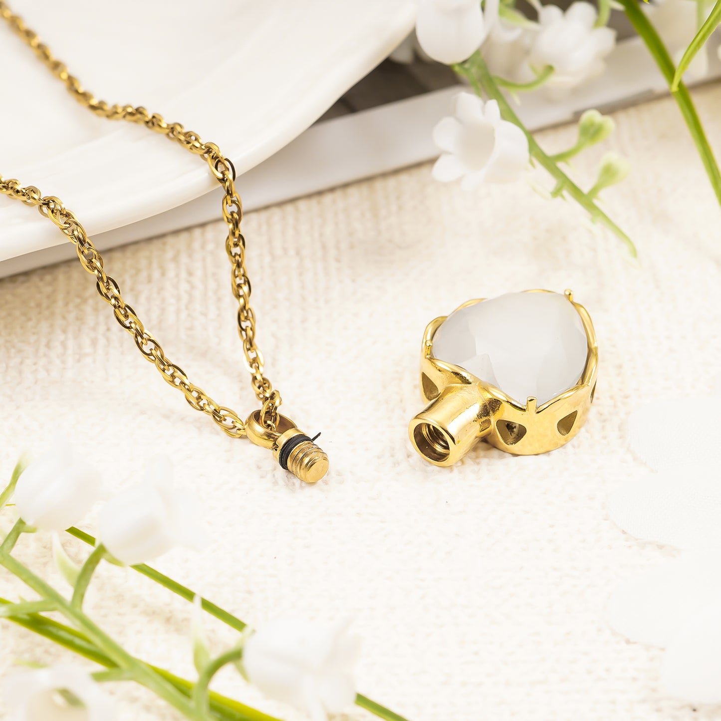 Gold heart pendant with white stone for ashes