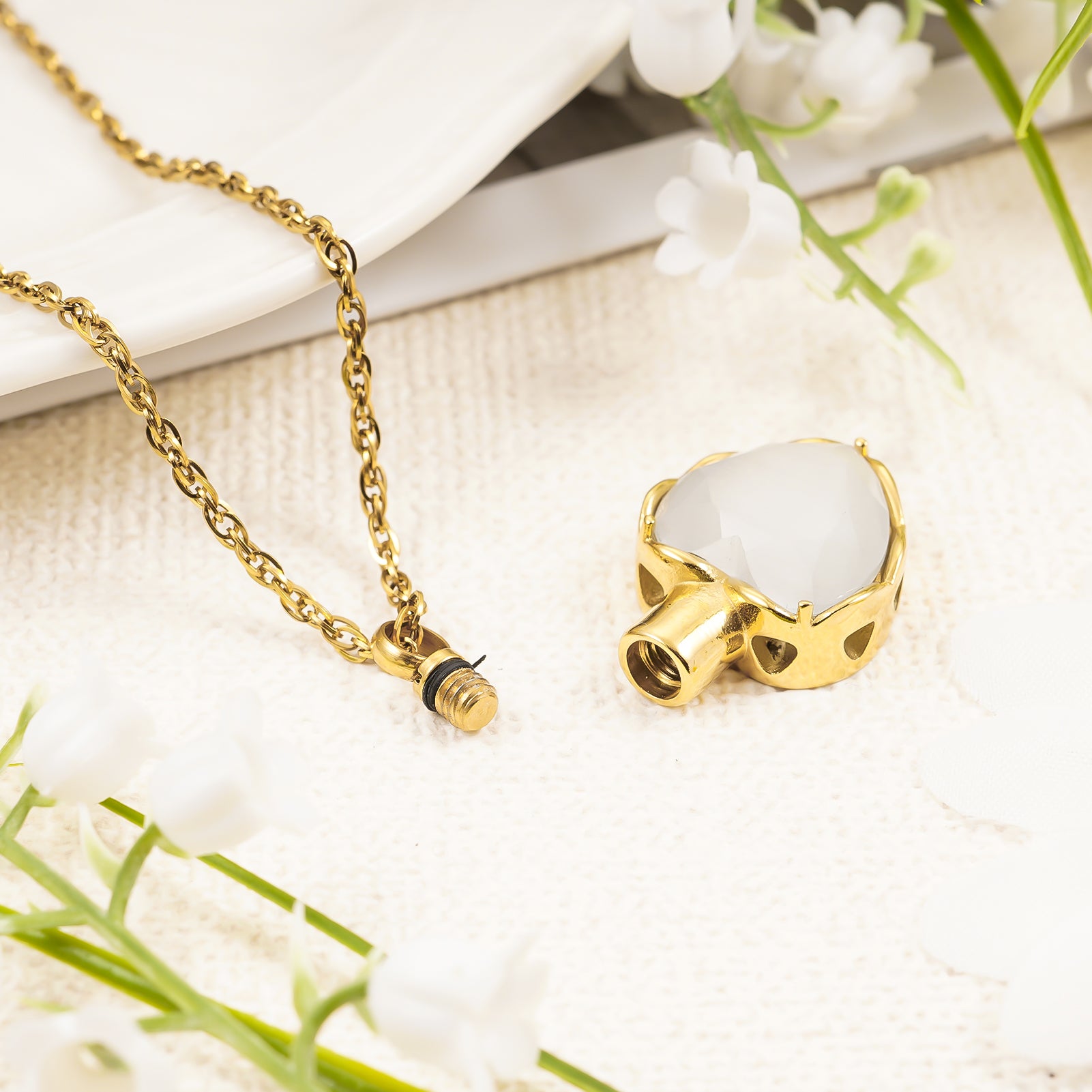 Gold heart pendant with white stone for ashes