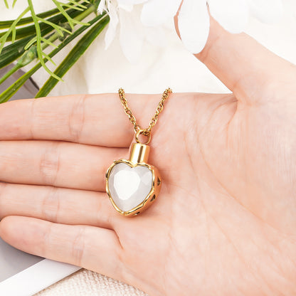 Gold heart pendant with white stone for ashes
